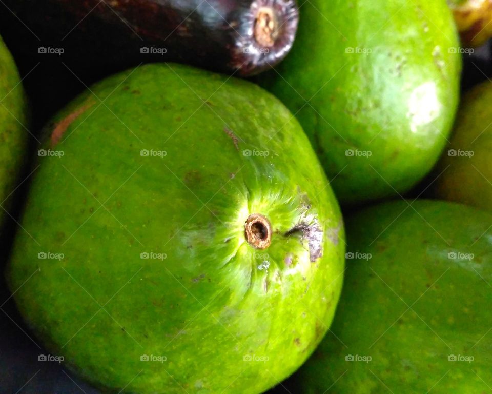 Fresh avocado fruit on market