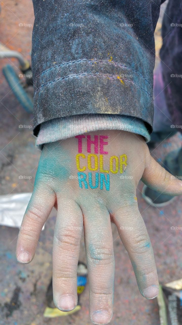 Tattooed. my nephew does the color run with us and we temporarily tattoed his hand