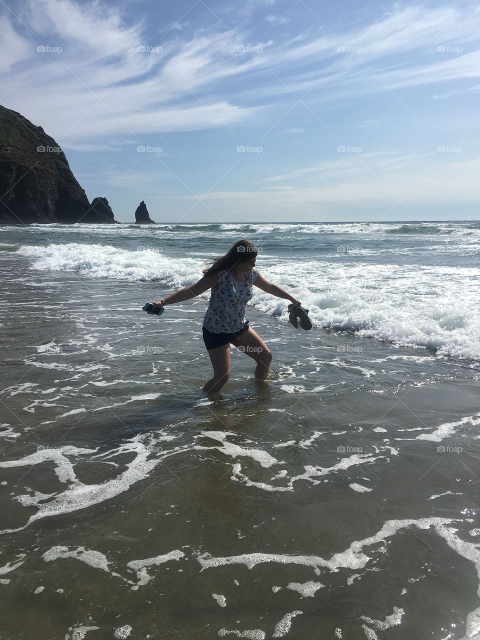 Stretching in the water - Cannon Beach, OR