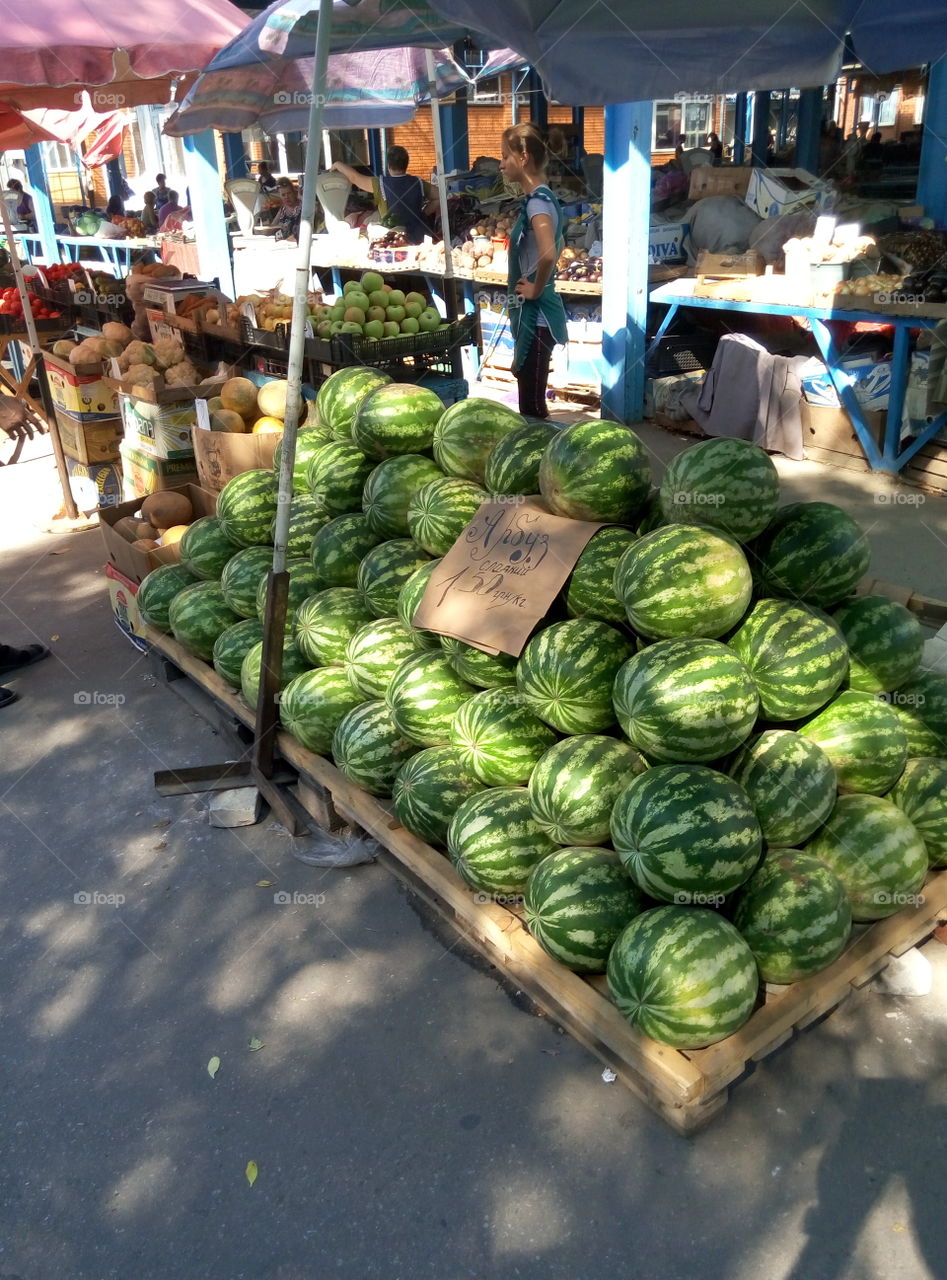on the food market. Watermelons sold on Kherson market