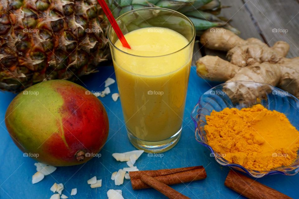 Pineapple mango coconut turmeric coconut cinnamon ginger smoothies