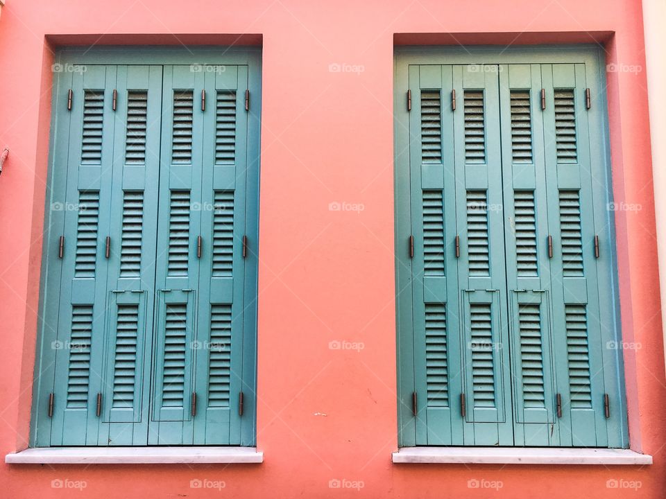 Blue windows and pink walls