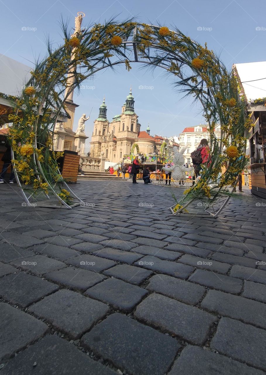 Easter Prague. St. Nicholas Church on Old Town Square.