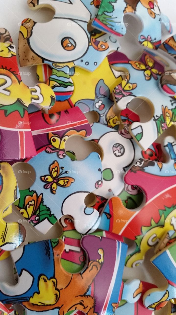 Jigsaw puzzle. Colorful pieces of jigsaw puzzle