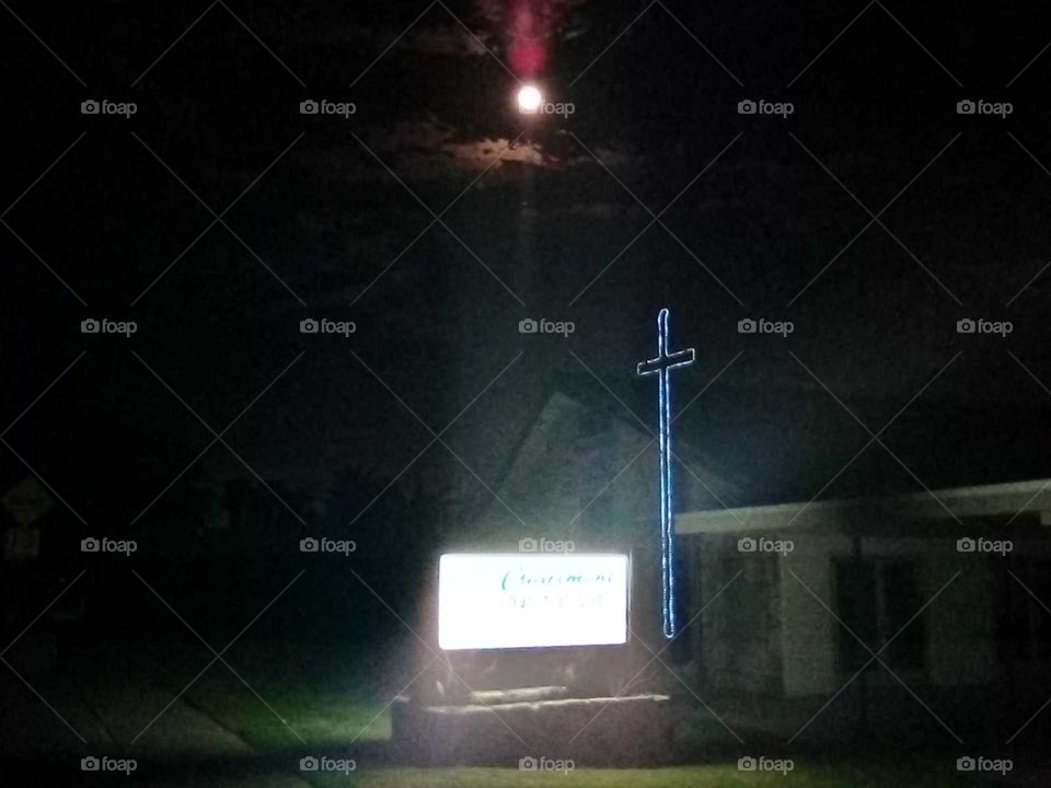 Blood Moon over a church across the street