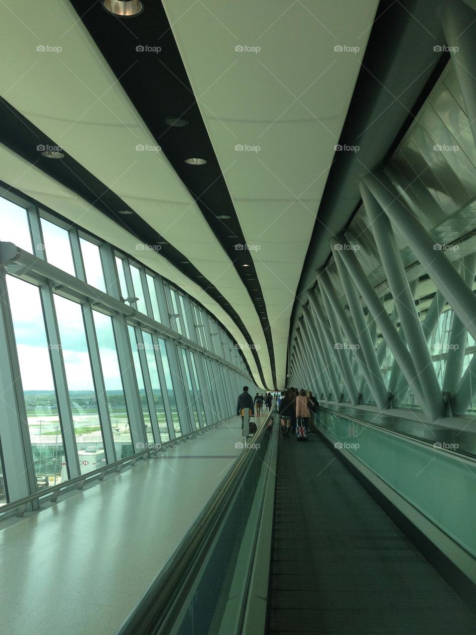 Commuters on a travelator