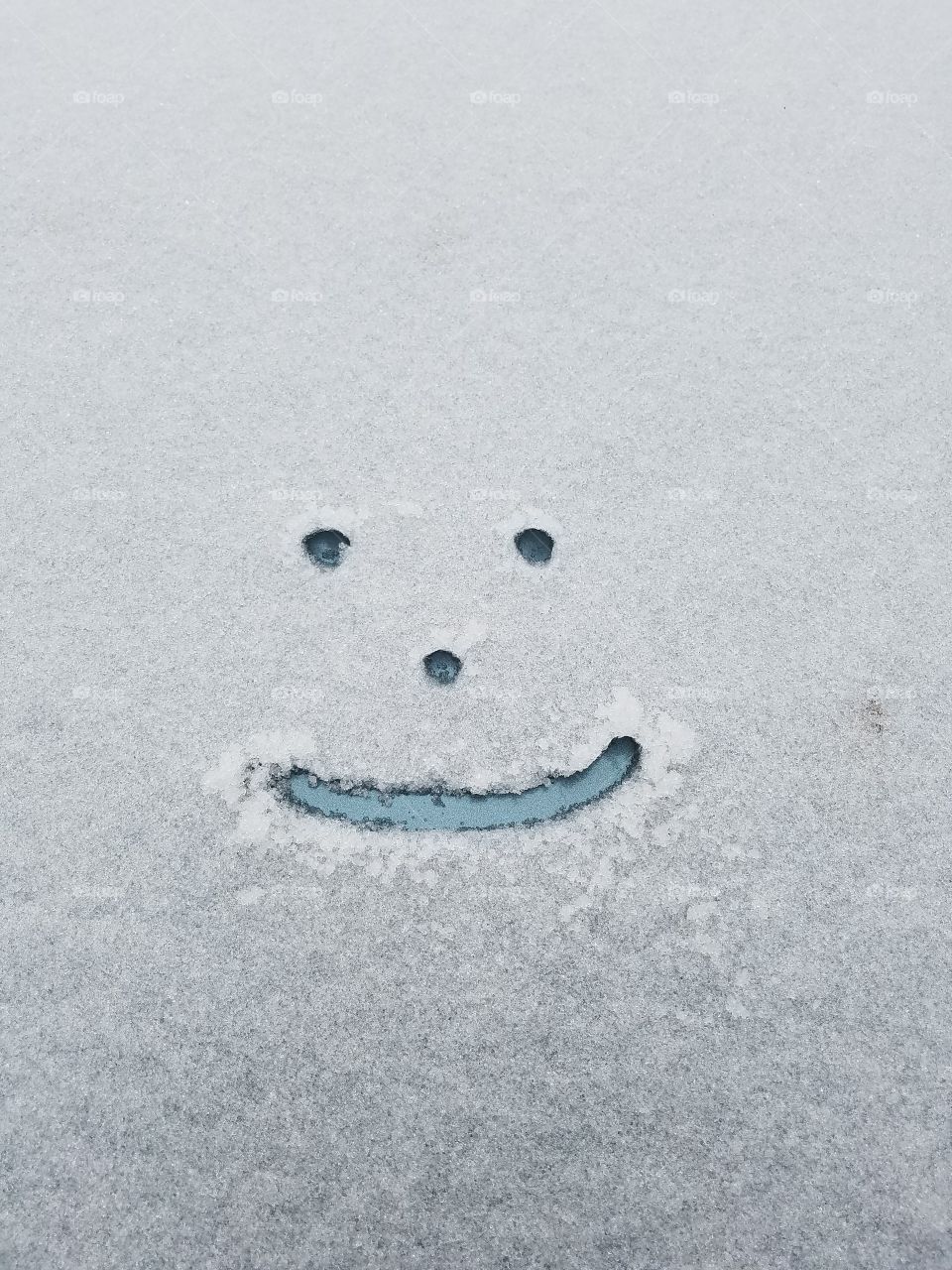 Smilie Face in Snow