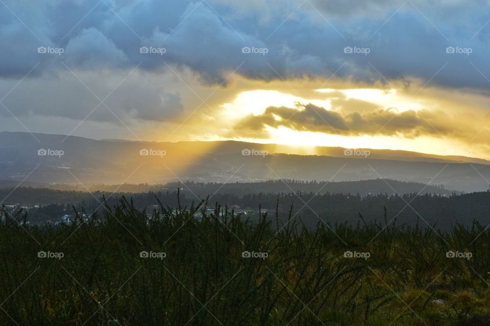 Sunset in the storm. View from the lookout at Mount Pedroso, Santiago de Compostela