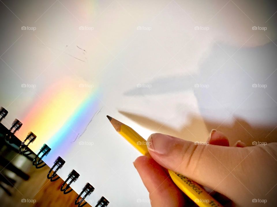 Rainbow Light Refraction On Paper From Drawing Book With Light Shadows.