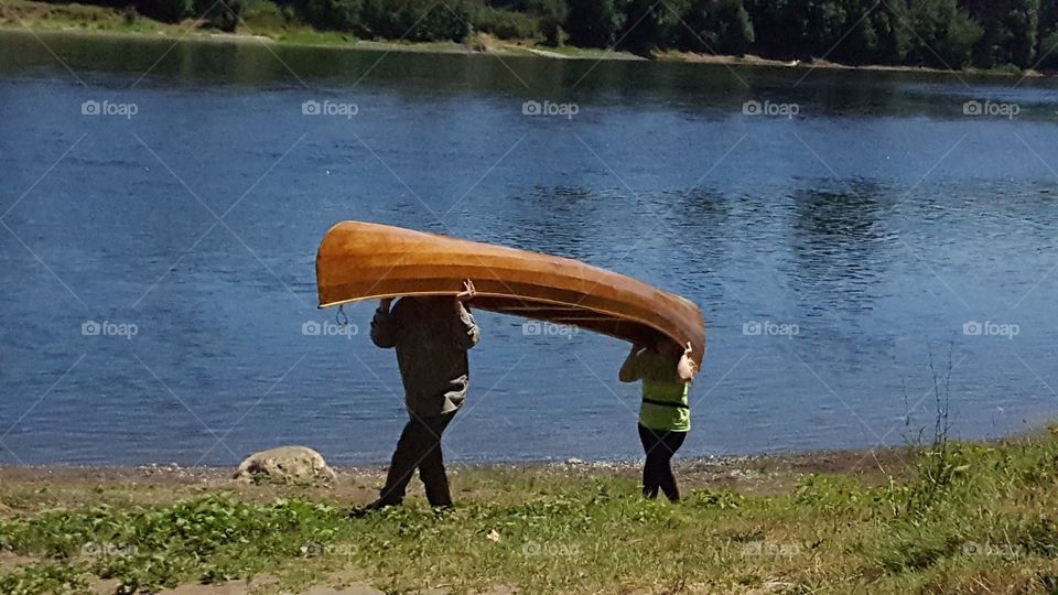 carrying canoe