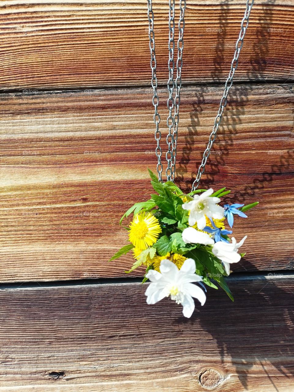 spring bouquet, flowers, spring, sunny day, May, flowers, bouquet, house facade, boards, chains, white flowers, yellow flowers