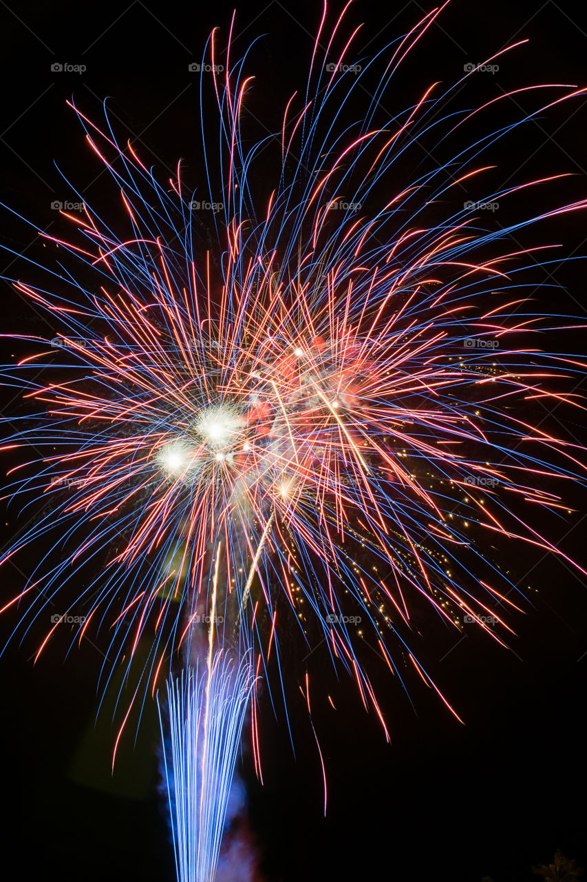 Illuminated of firework display at night