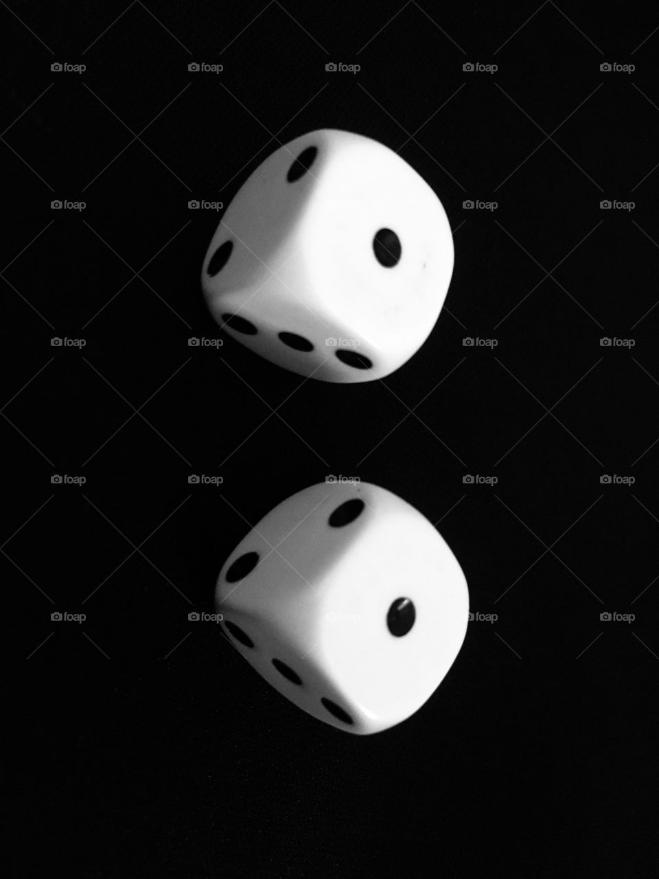 Lucky dice. Lucky ones. Snake eyes. Love the visual here. Stark contrast between black and white. Love the elements of symmetry.