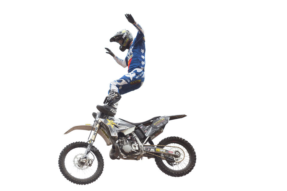 Doing stunts mid air on motocross 