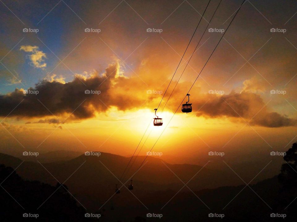 The cable cars in the sunset.