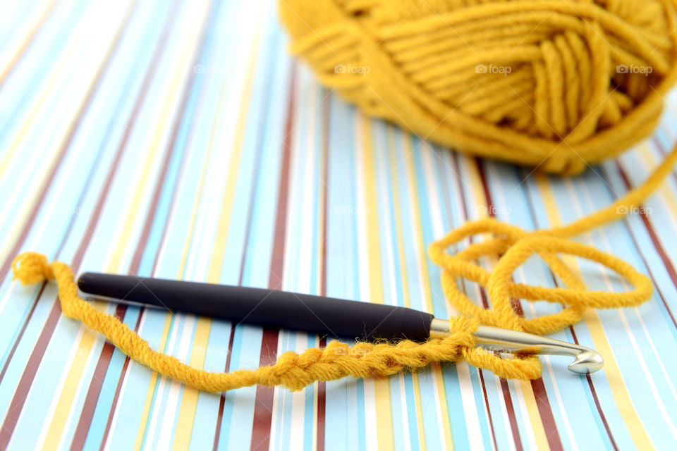 Wool ball and crocheting needle