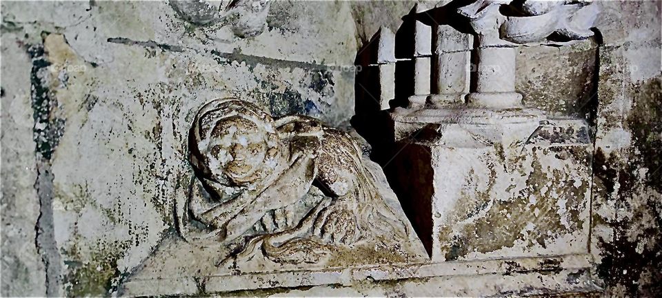 Carved into solid stone this relief is part of the “Regensburg”, “Oberpfalz” cathedral placed along the side isles. 2023. Hypnotic Productions