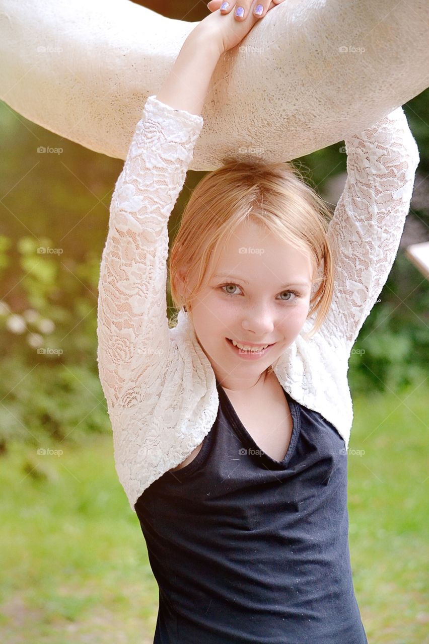 Happy face. Girl smiling towards the camera