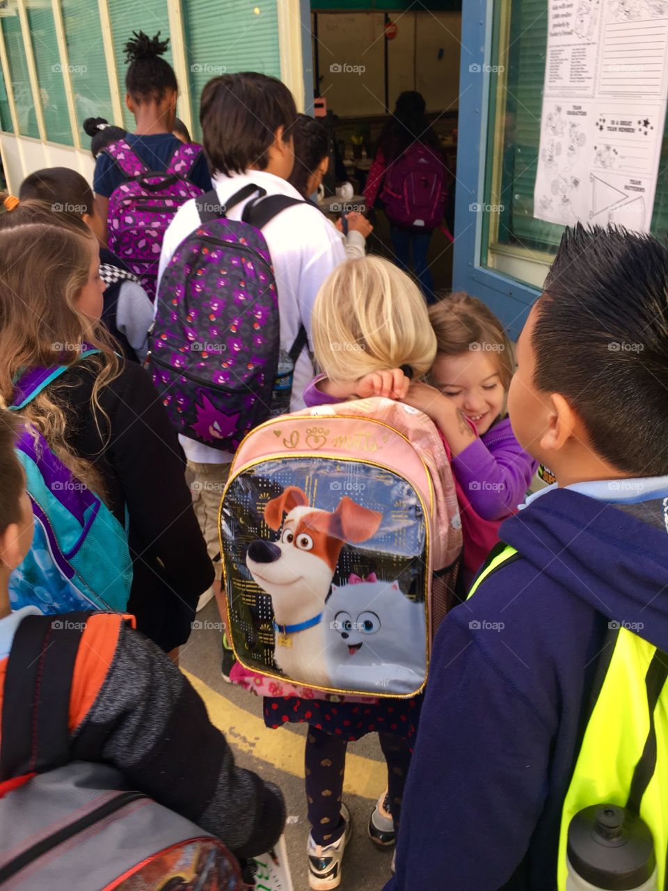 Children entering in classroom
