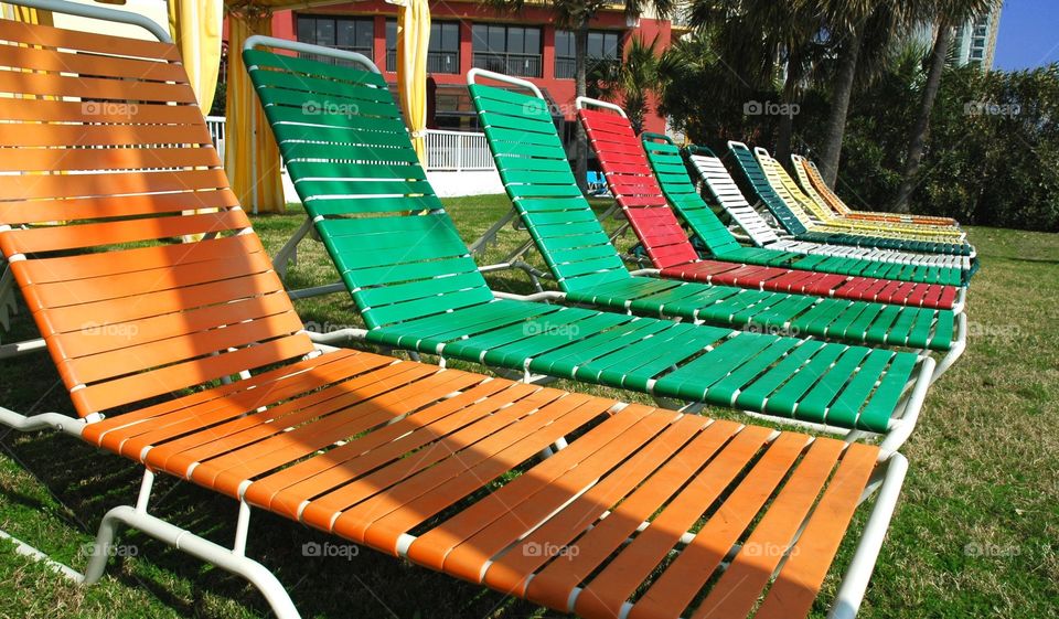 Colorful chaise lounges. 