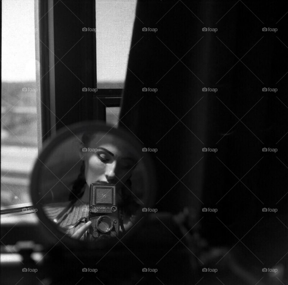 Self-portrait in a 20th century film camera. 