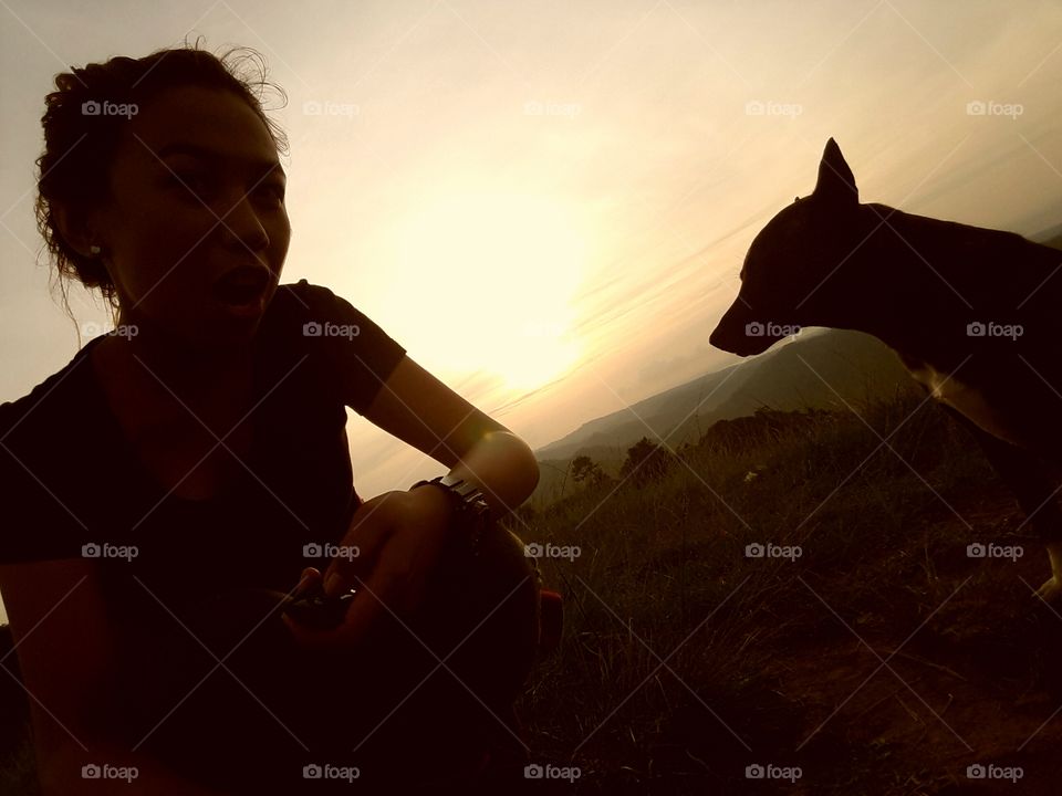 Silhouette my girlfriend and the resident dog in Mt. Naupa.