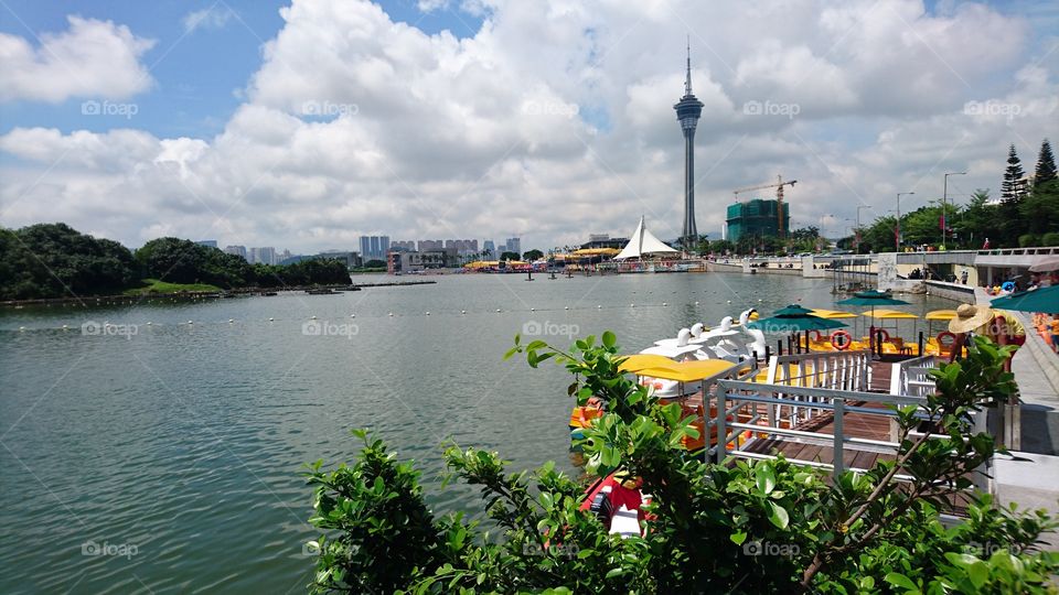 Macau tower with idyllic lake