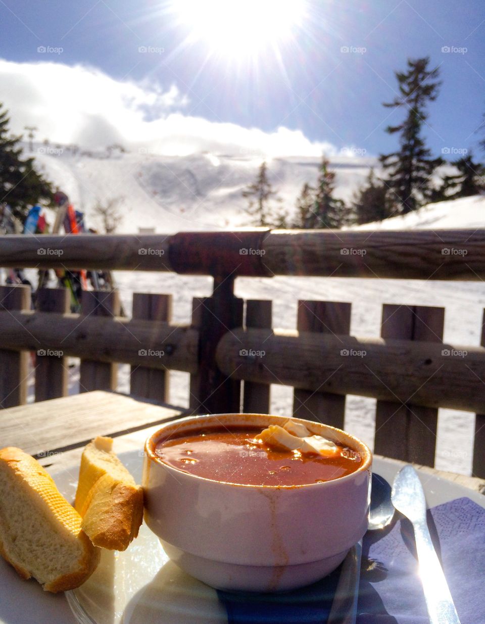 Close-up of soup and bread on table