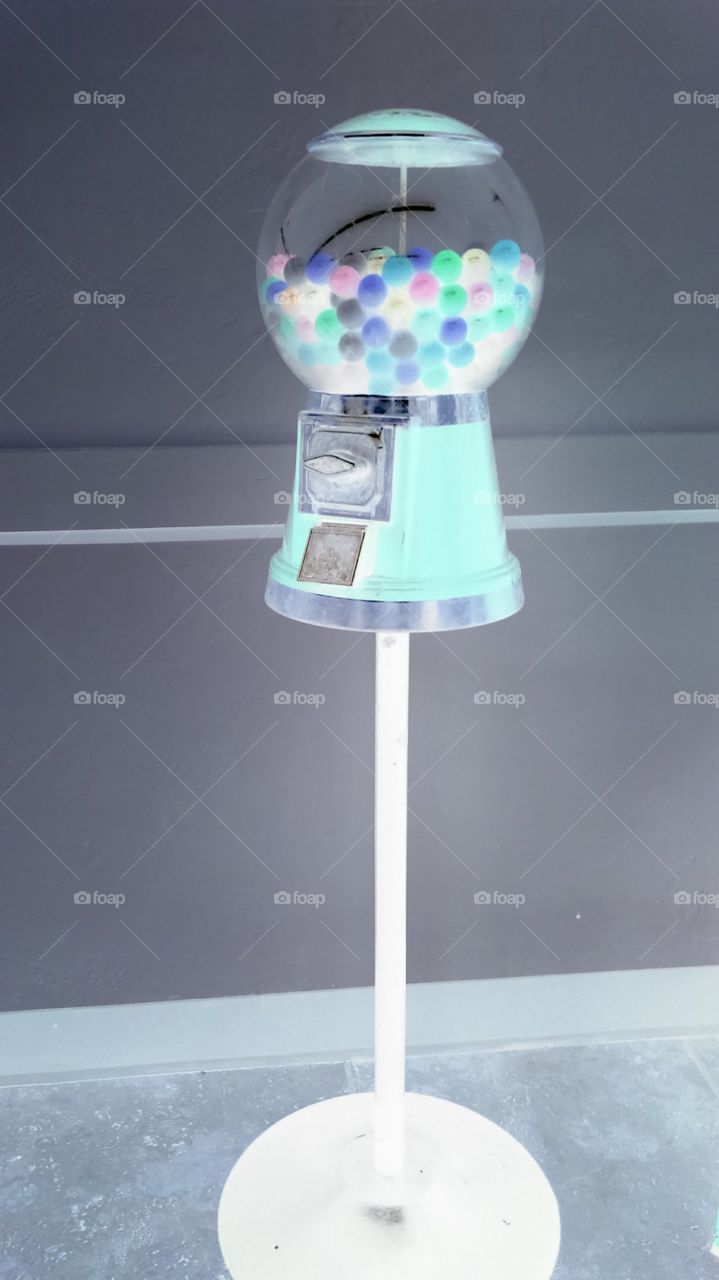 negative candy. taking negative pictures of a gumball machine
