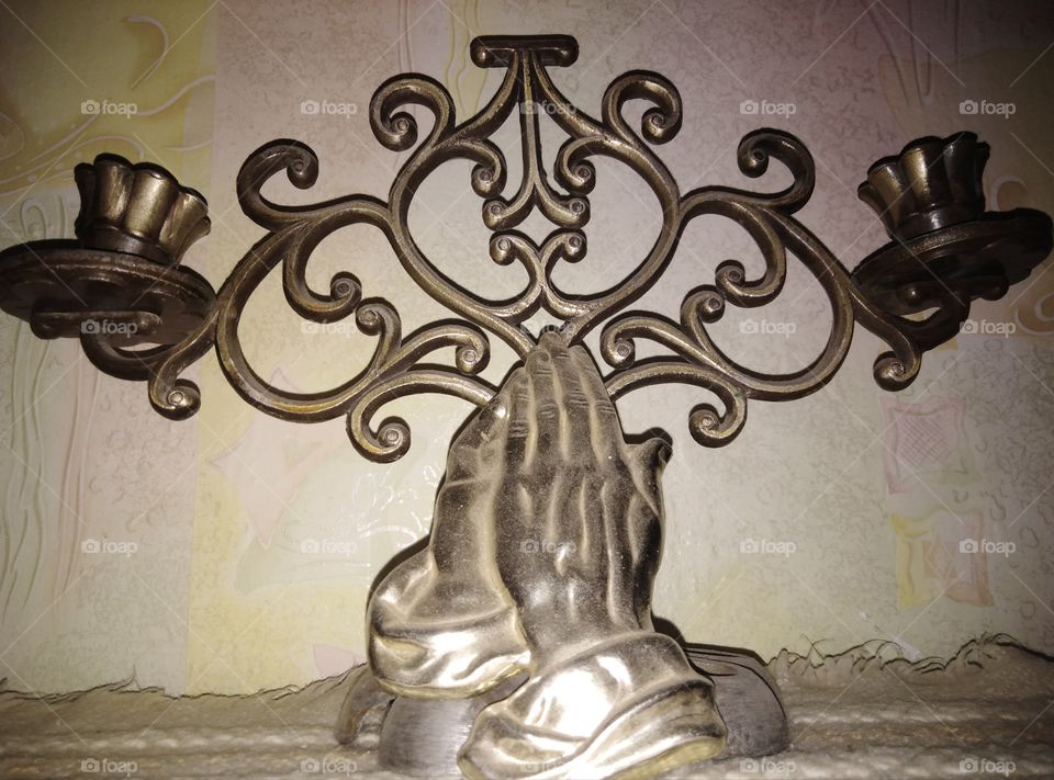 Candlestick and prayer.
