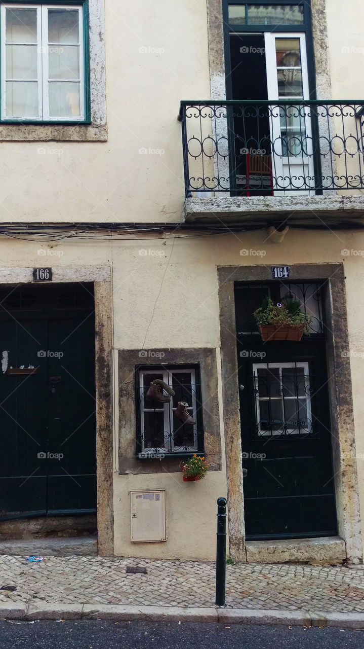 doors and windows of an old building in a European town