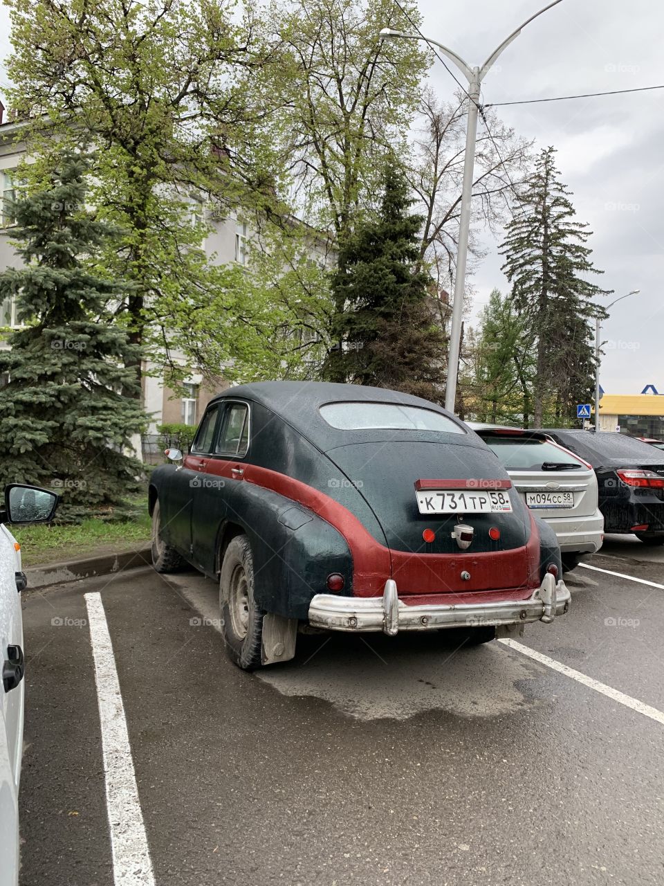 Vintage car in city street 