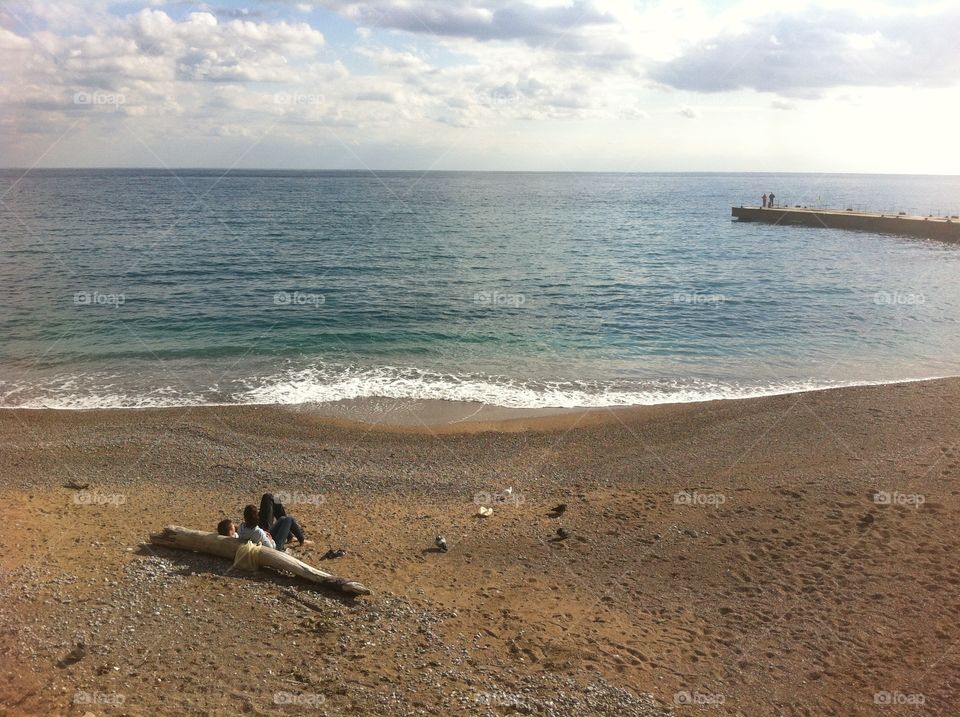 Couple at the empty seaside