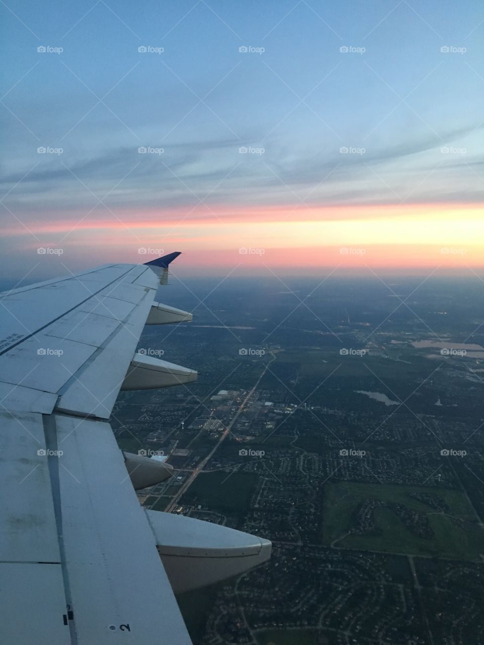 Airplane over Chicago suburb 