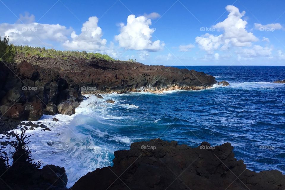 Blue skies, waves, and lava