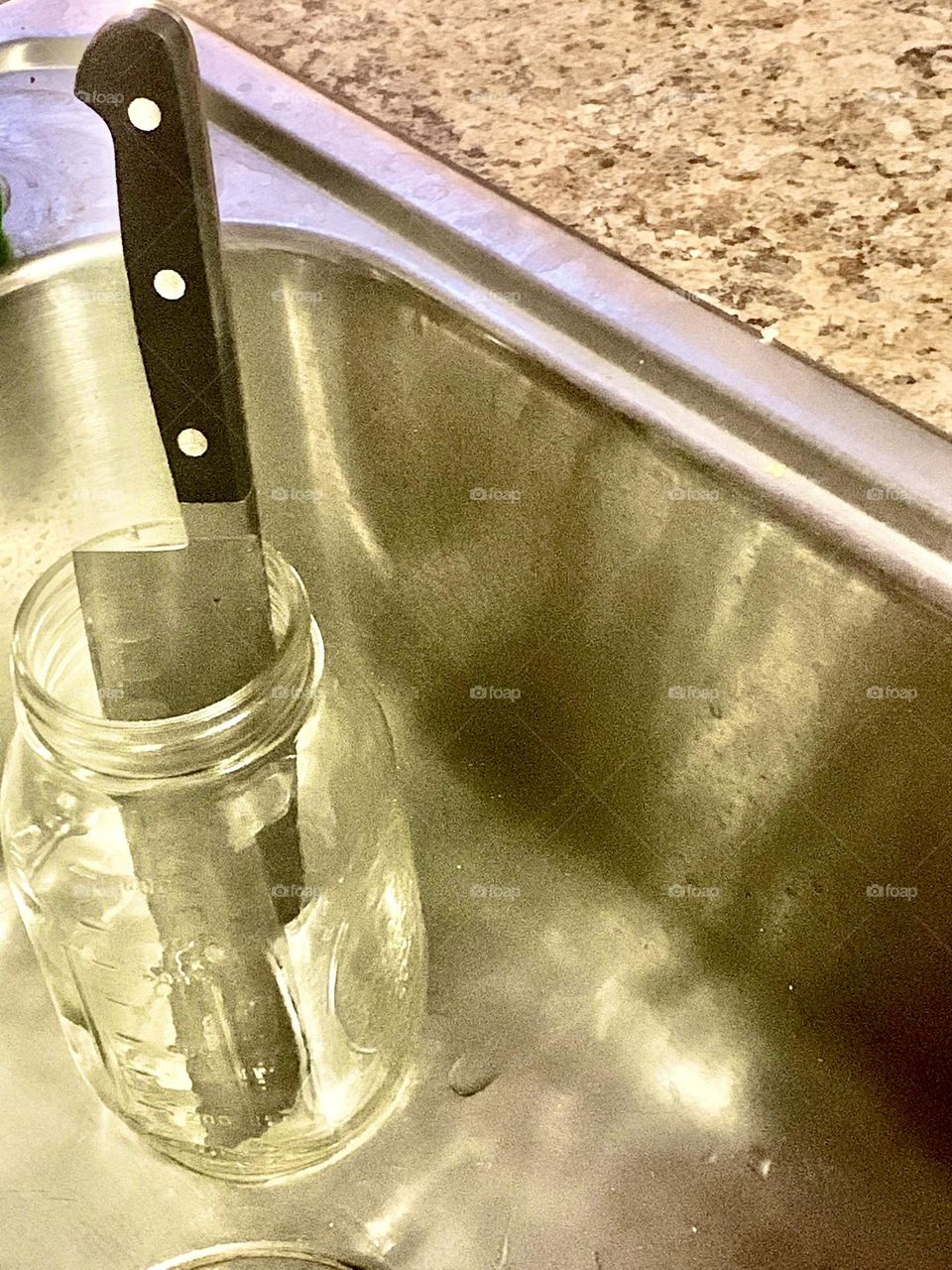 Knife in sink 