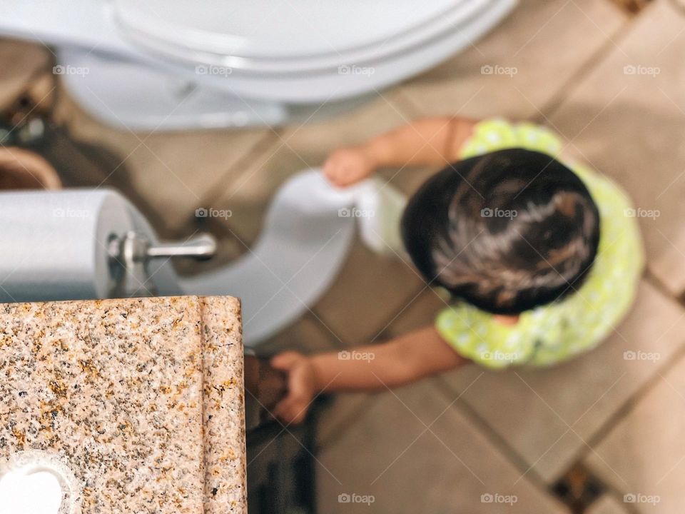 Baby is surprised by mother, mother is surprised by baby unrolling toilet paper, secret baby projects, baby is secretly making a mess, surprises for mommy, surprise messes for mommy 