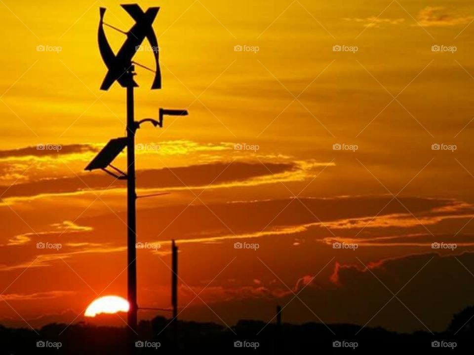 Sun Setting on a Windmill