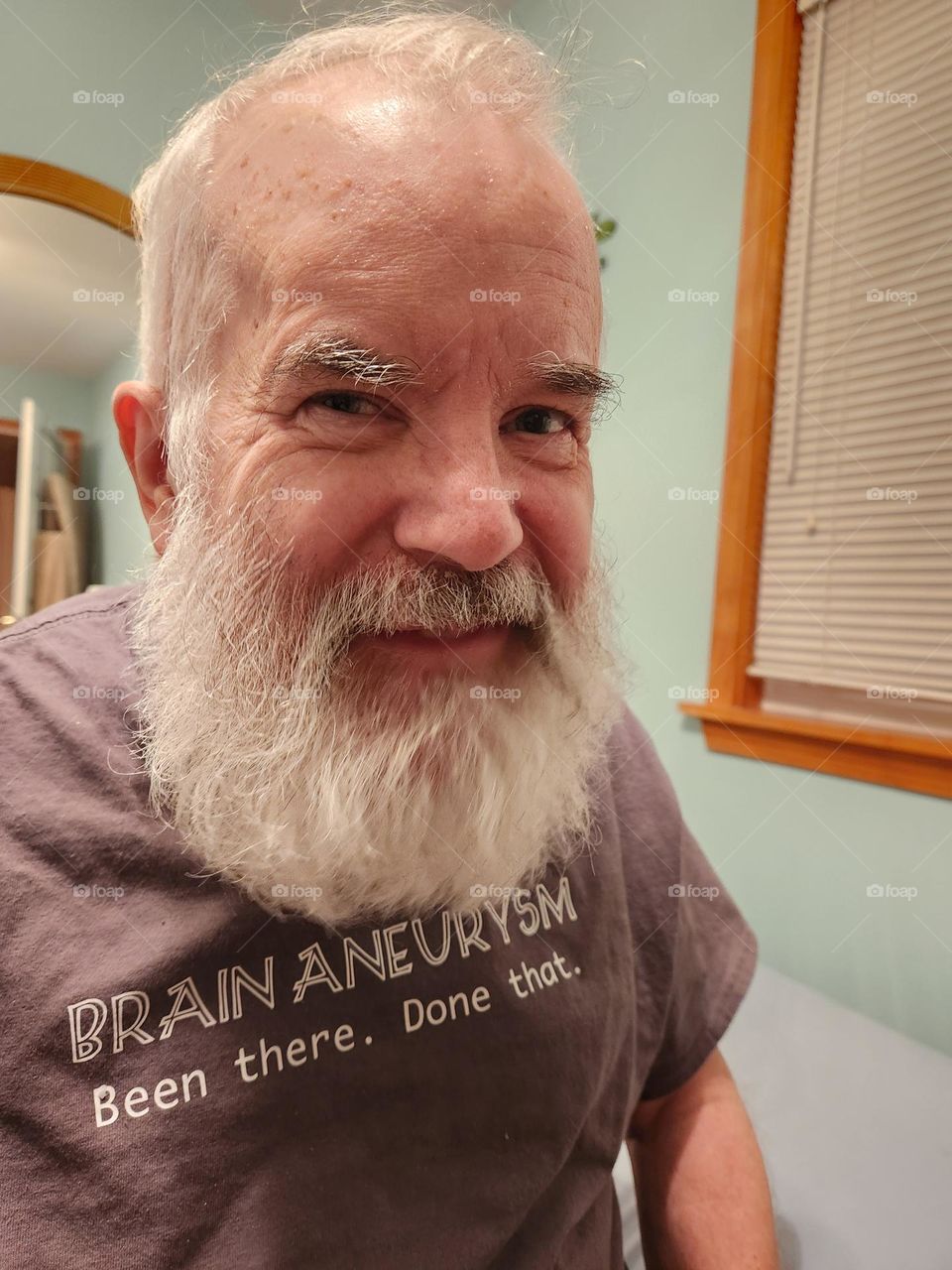 Brain aneurysm, craniotomy survivor living his best life.