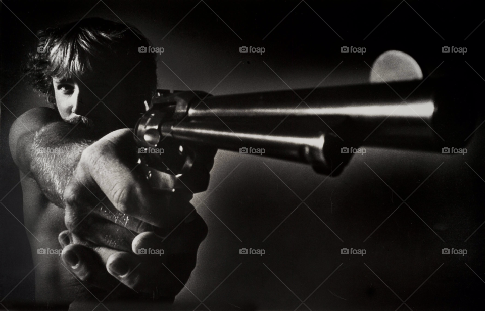 nra hand gun owner. gun violence in america - usa - pistol by arizphotog
