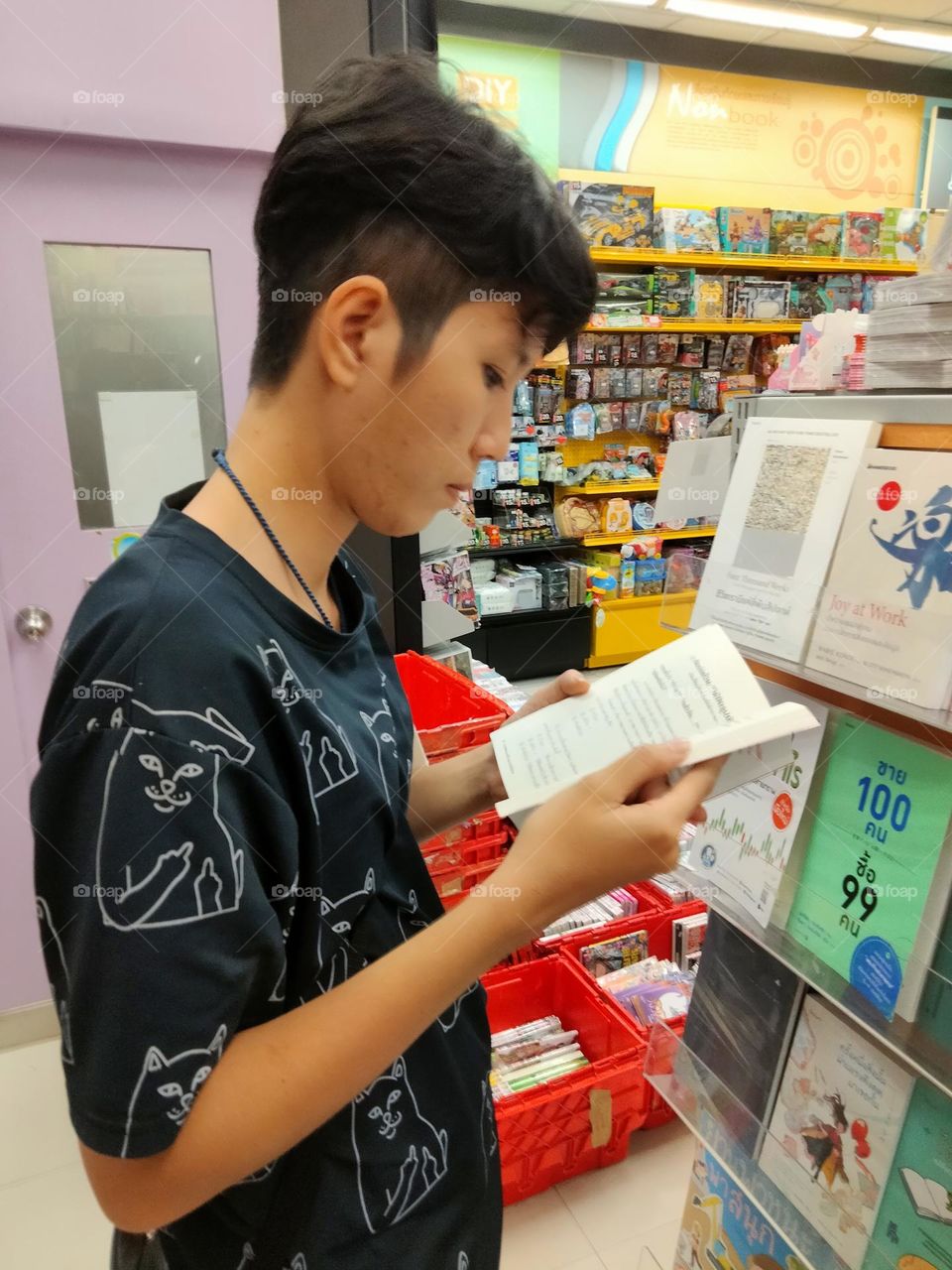 Person reading a book.