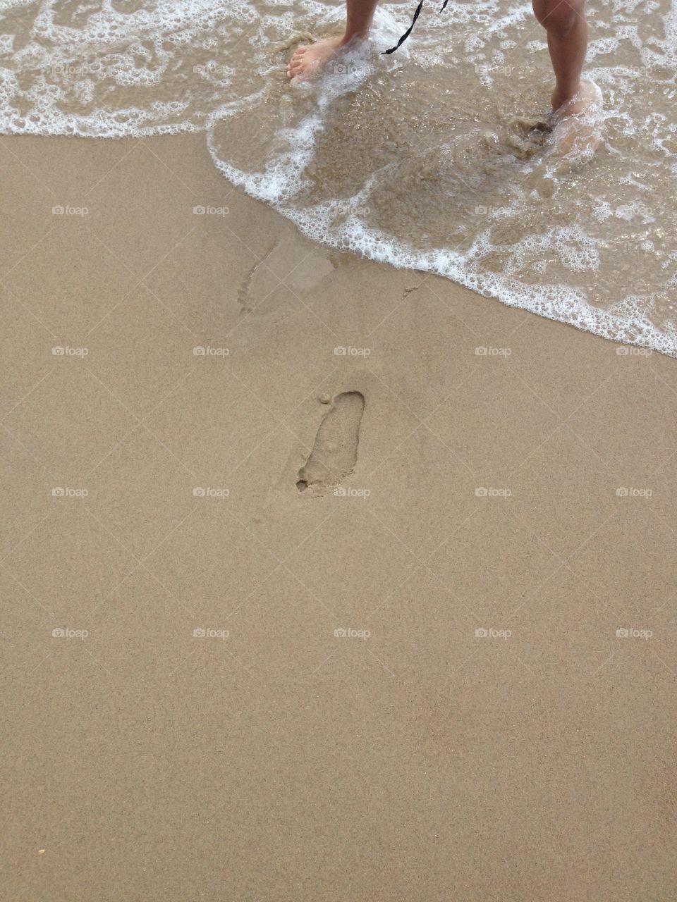 Foot step on the sand