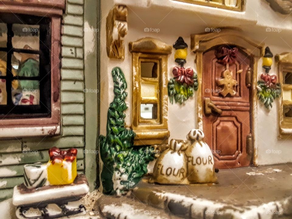 side closeup of tiny ceramic Christmas bakery