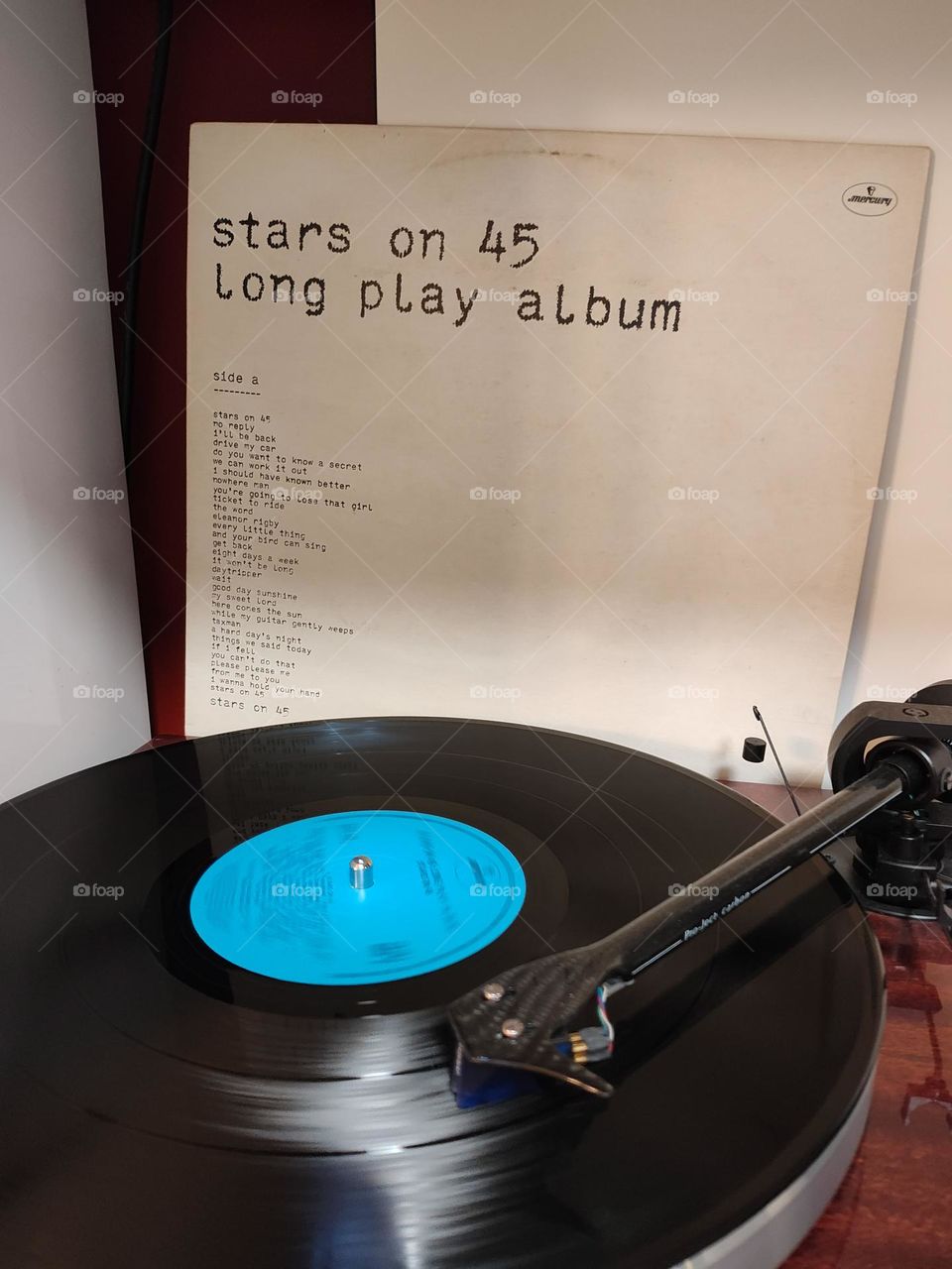 Stars on 45 long play vinyl album on a turtable