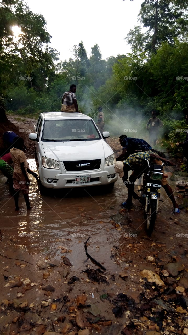washing my car and a bike at the stream