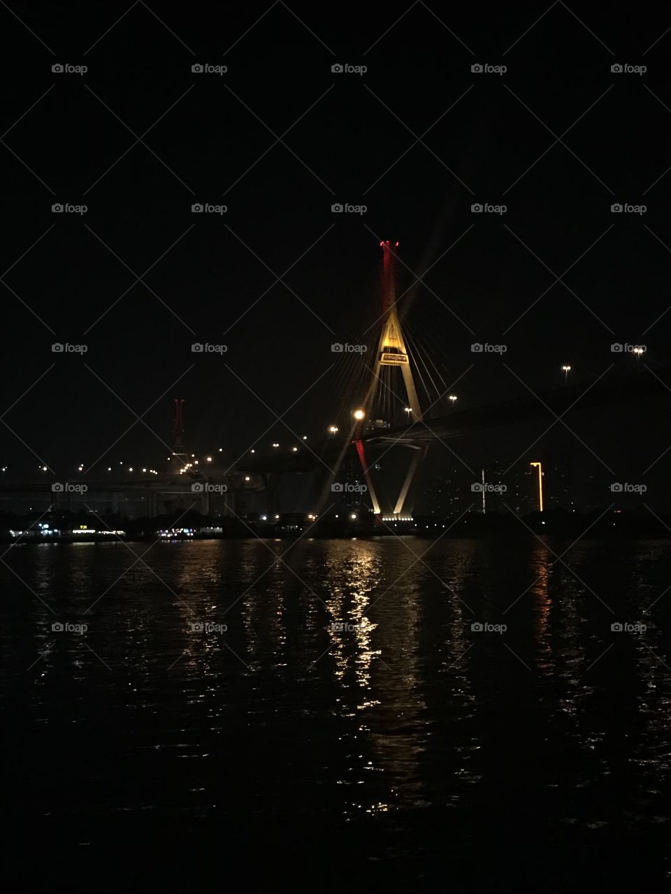 This is Bhumibol Bridge. It's about 20.00 pm and It's very peaceful and beautiful. 