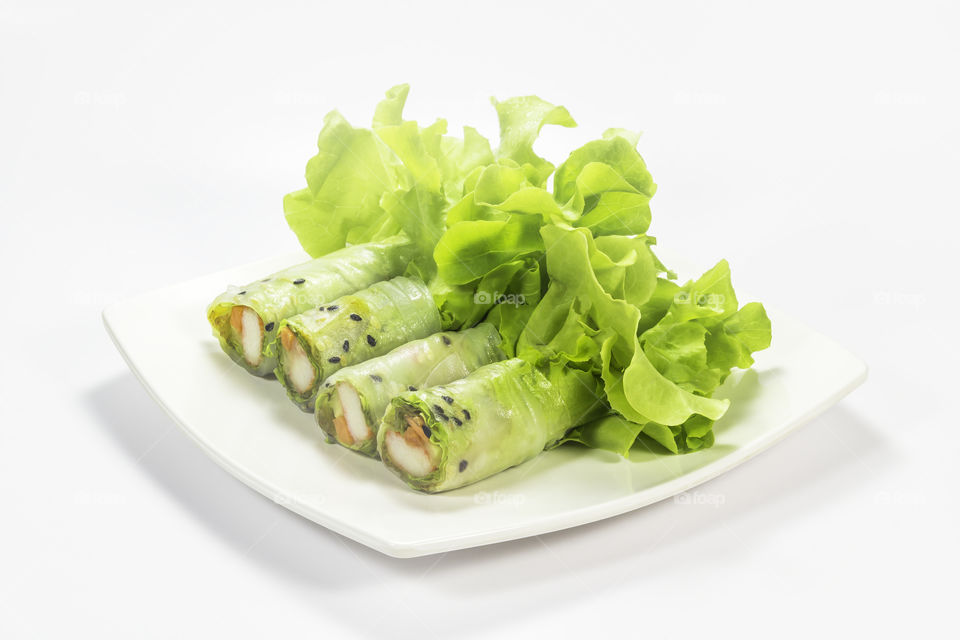 Salad roll. Salad roll with vegetable on the plate