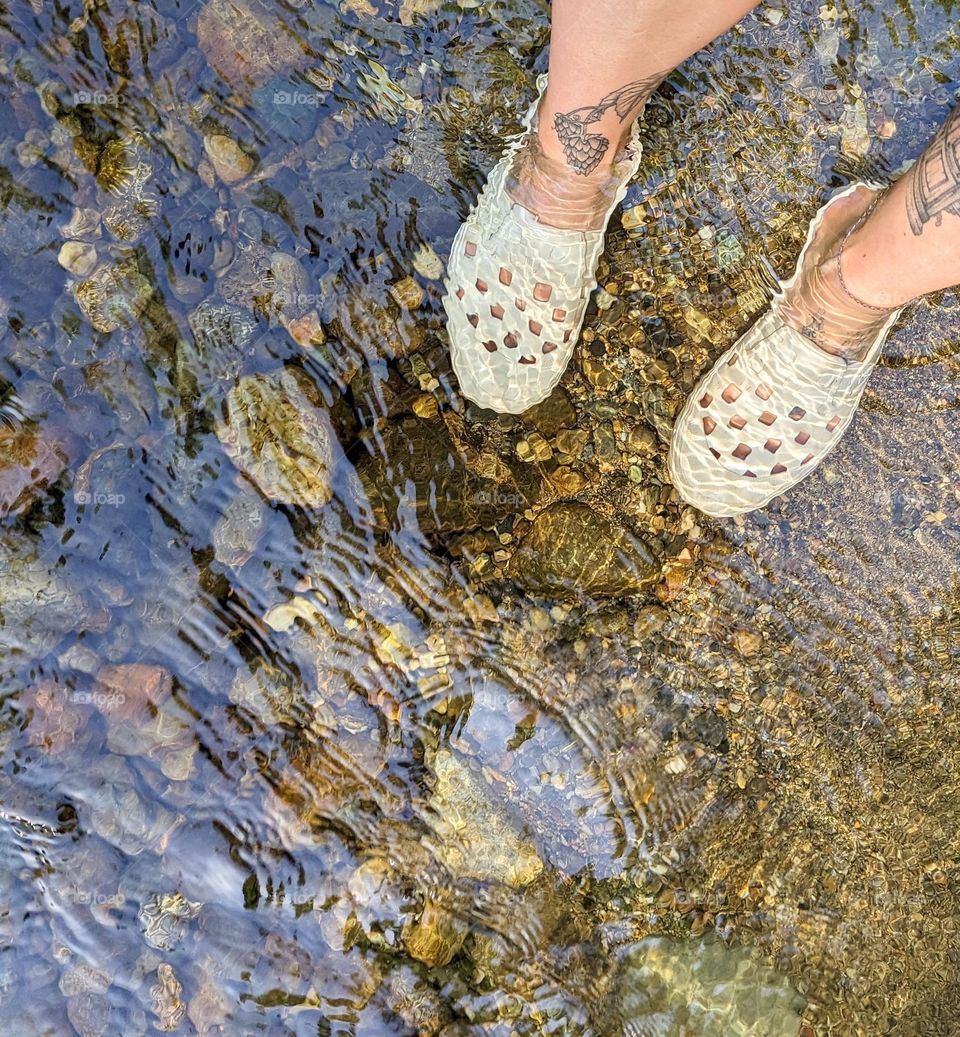 feet cooling in clear running water of the river through fern canyon glimmer moment glimmer mission happiness moment of zen