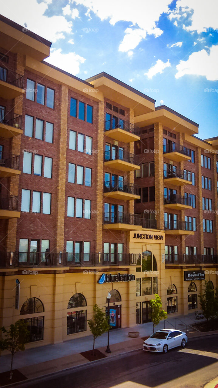 apartment building and blue skies