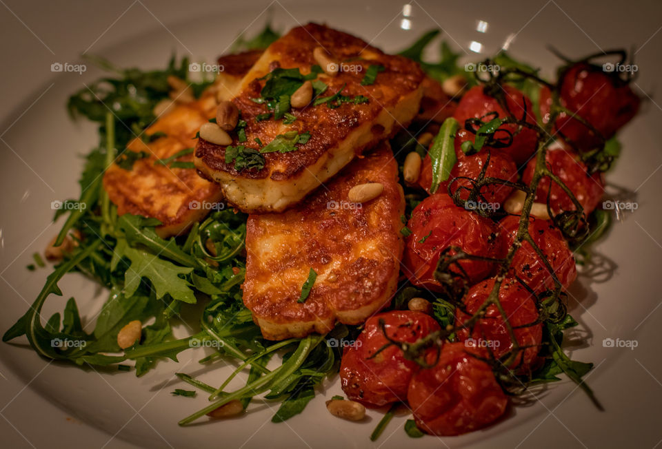 Grilled harissa halloumi and roasted tomatoes 